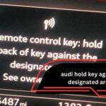 audi hold key against designated area